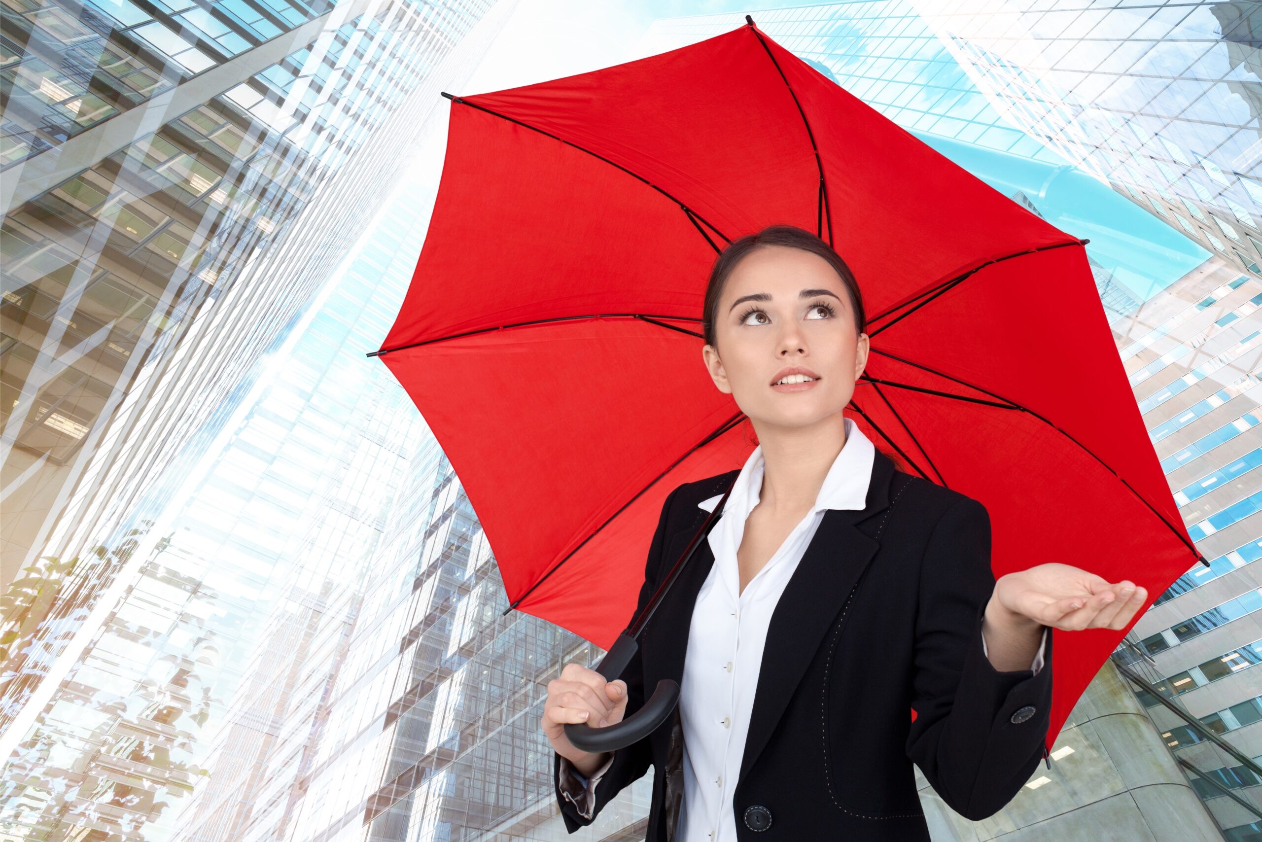 Beautiful businesswoman portrait with umbrella